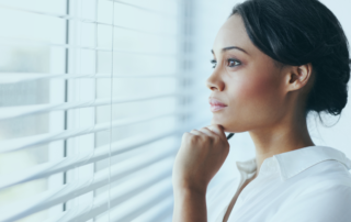 Woman looking out the window.