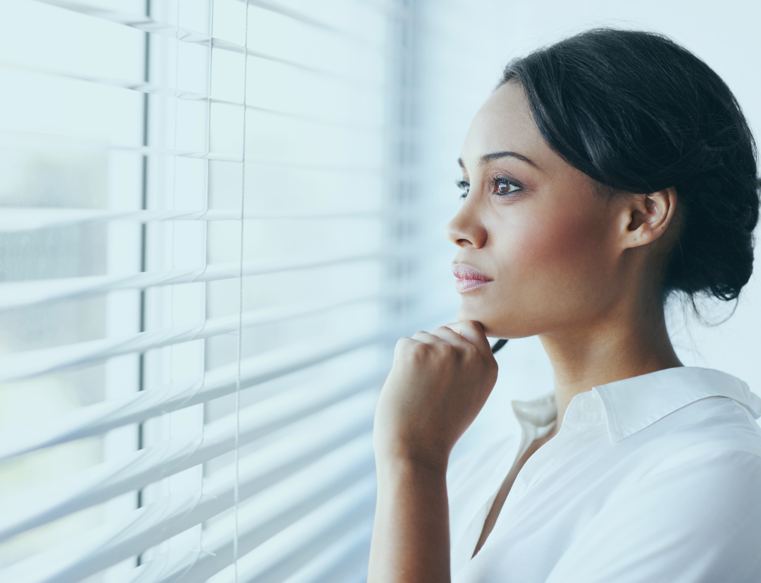 Woman looking out the window.